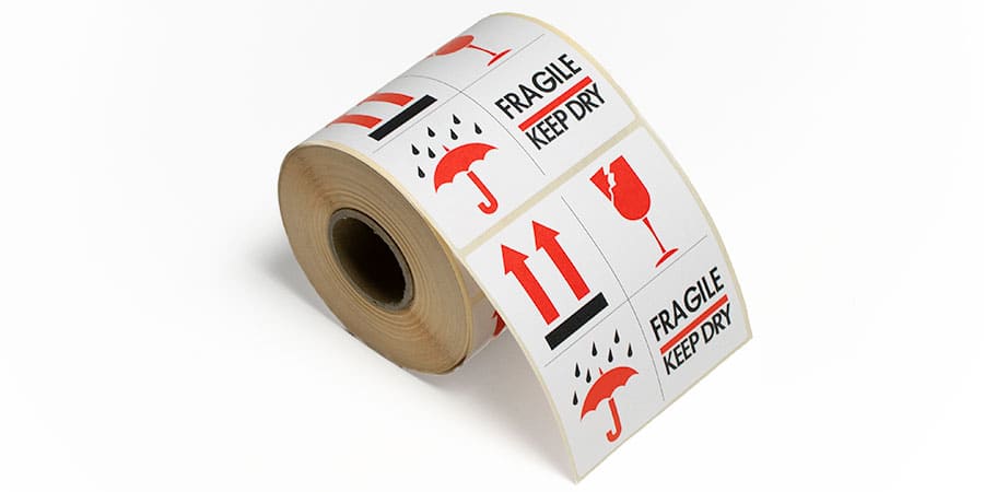 Etikettenspender klein für 1 Rolle mit Etiketten "Fragile - Keep dry"
